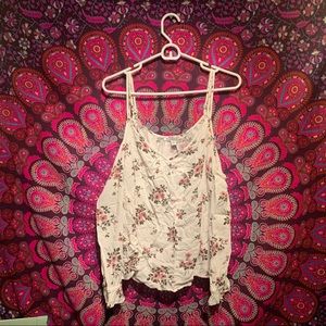 Cream cold shoulder top with floral print!
